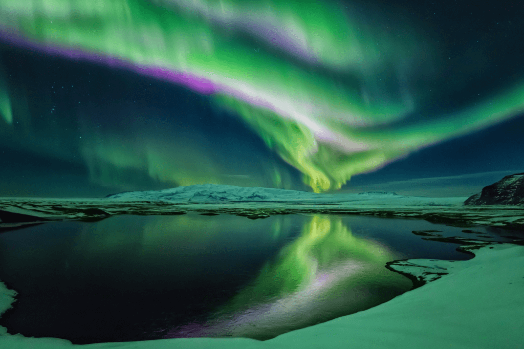 Northern lights over a lake in Iceland