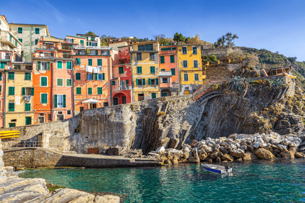 beautiful colored homes along the blue water of Cinque Terre