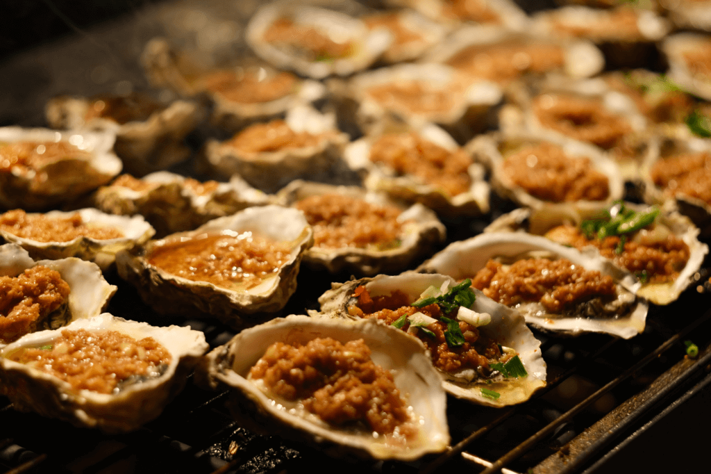 grilled oysters on a grill