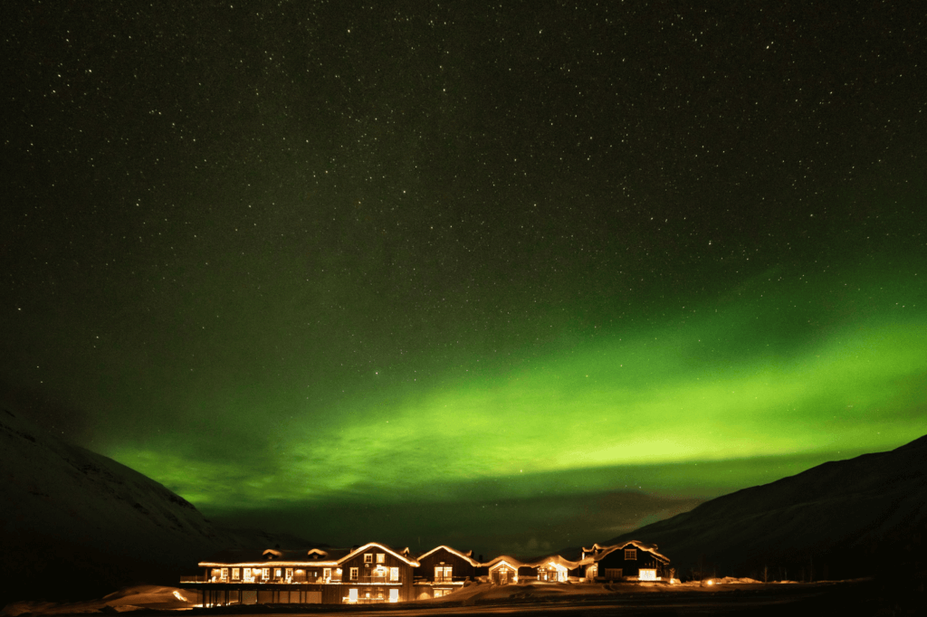 Northern Lights over a hotel in Iceland